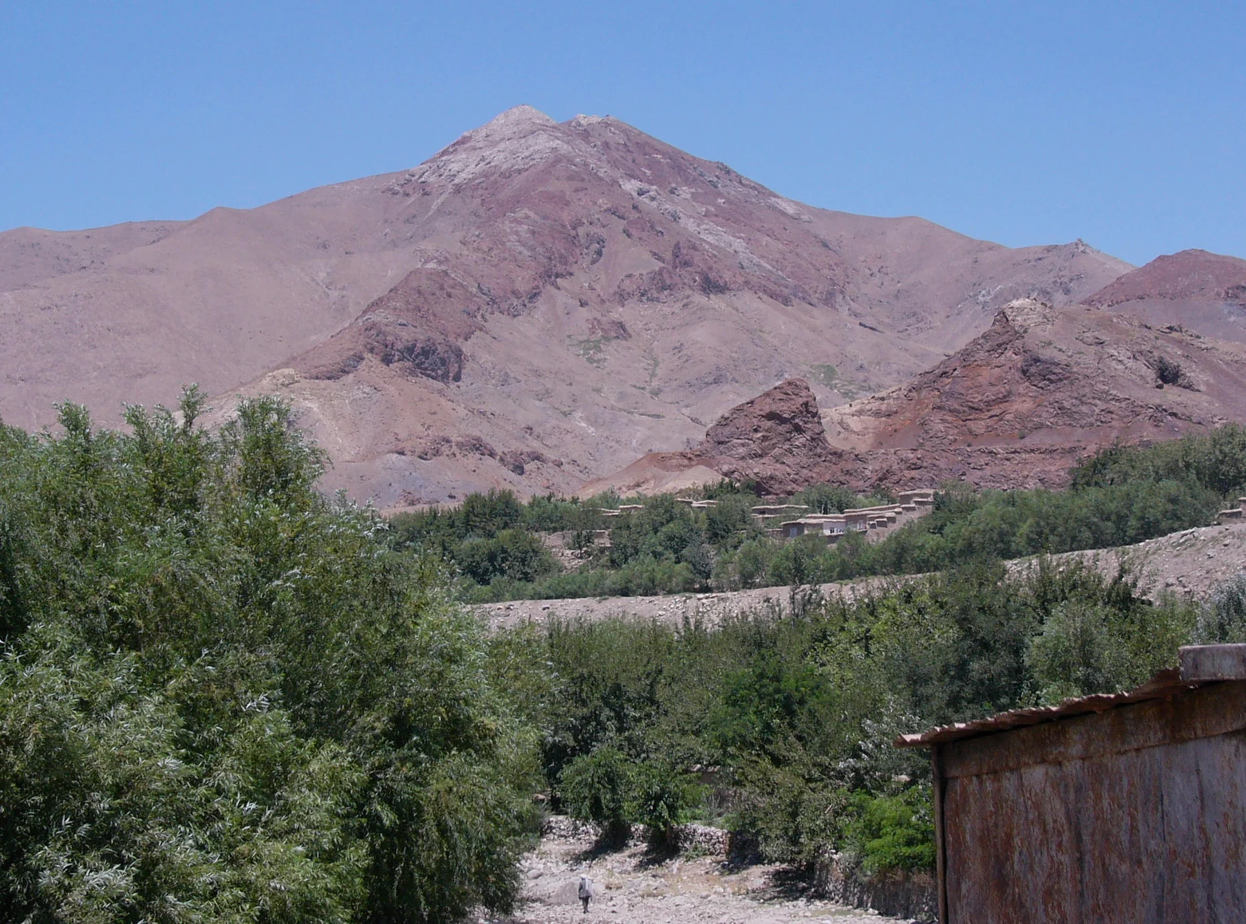 Mountain scenery and buildings on the road towards Salang in Parwan.