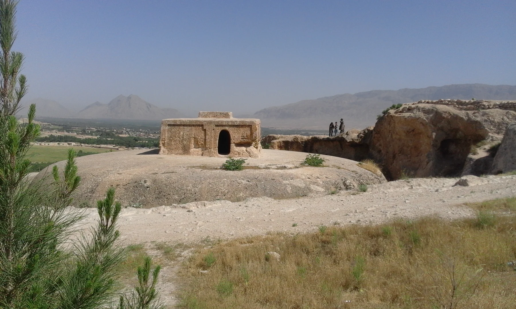 The rock-cut monument and surrounding trench at Takht-e Rostam above the Samangan valley.